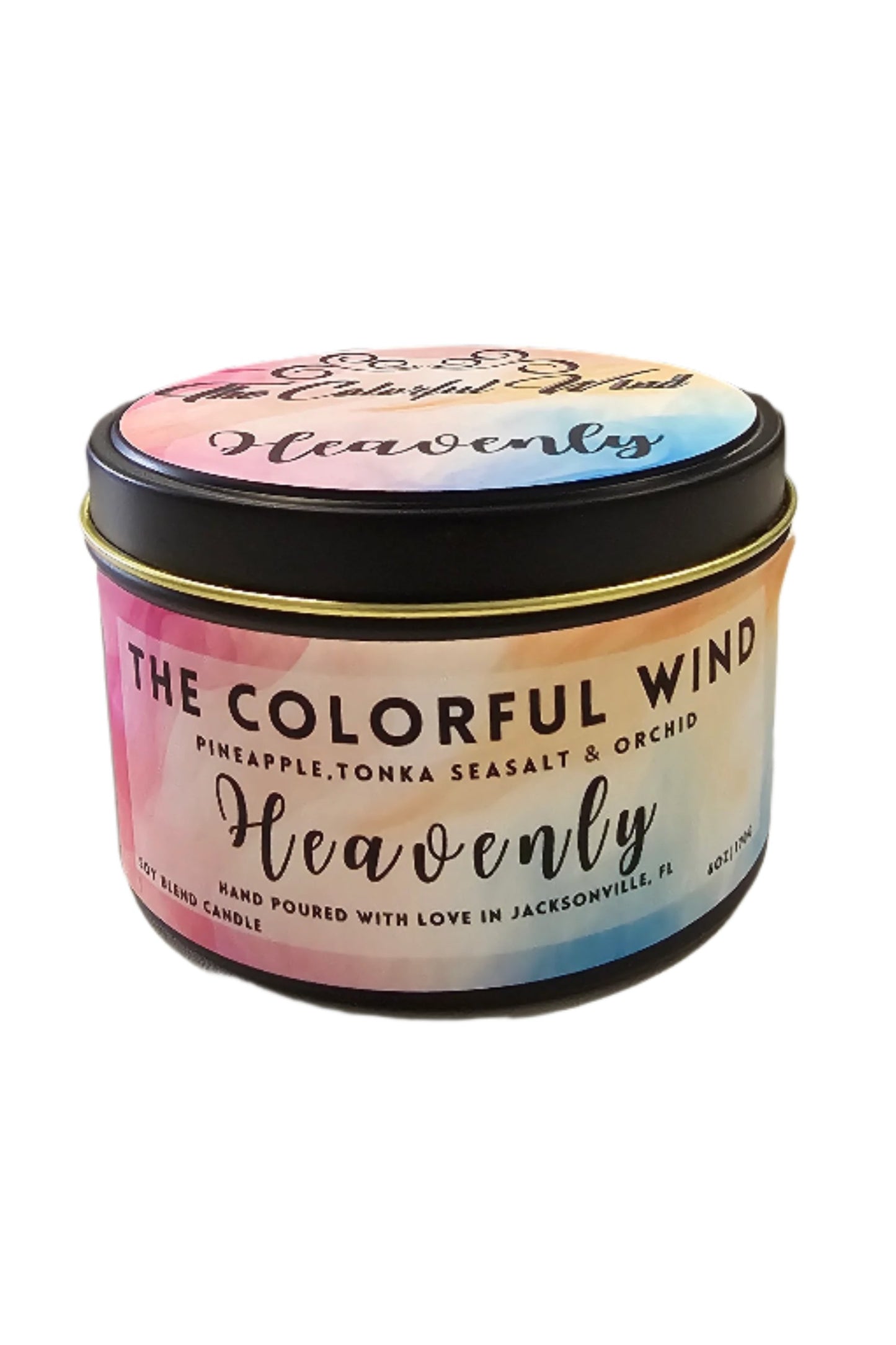 Heavenly medium candle in black tin with pink, blue, and gold label
