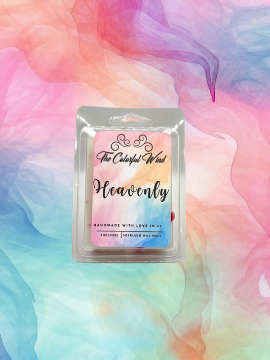 A wax melt package labeled 'Heavenly' by The Colorful Wind, centered against a pastel watercolor background with pink, blue, and purple tones.